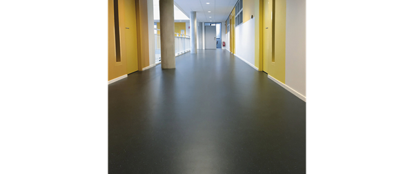 school corridor with noraplan unita flooring in dark grey